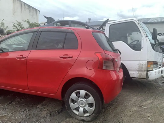 Scrap car loaded onto a truck in Rotorua for removal and recycling
