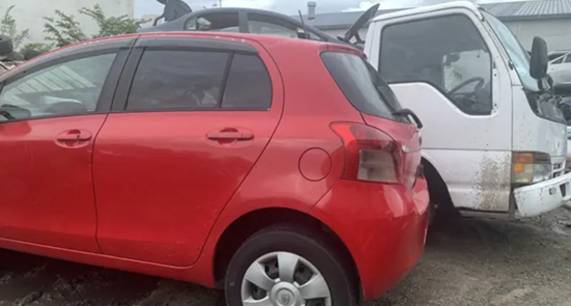 Scrap car loaded onto a truck in Rotorua for removal and recycling
